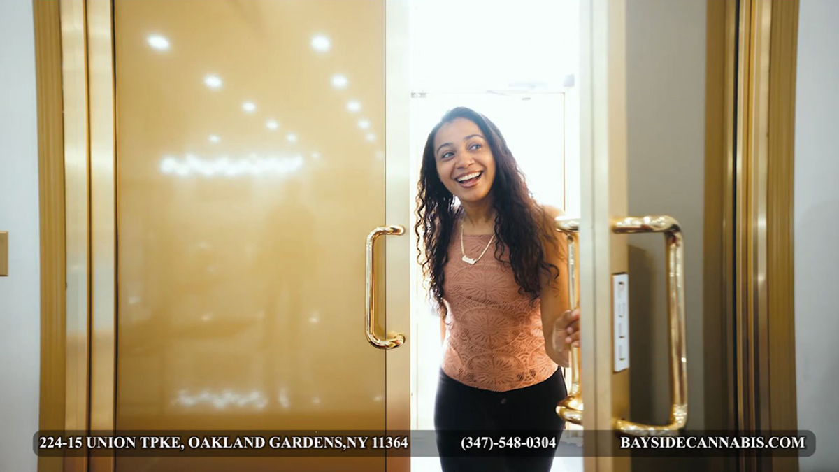 A woman entering a cannabis dispensary